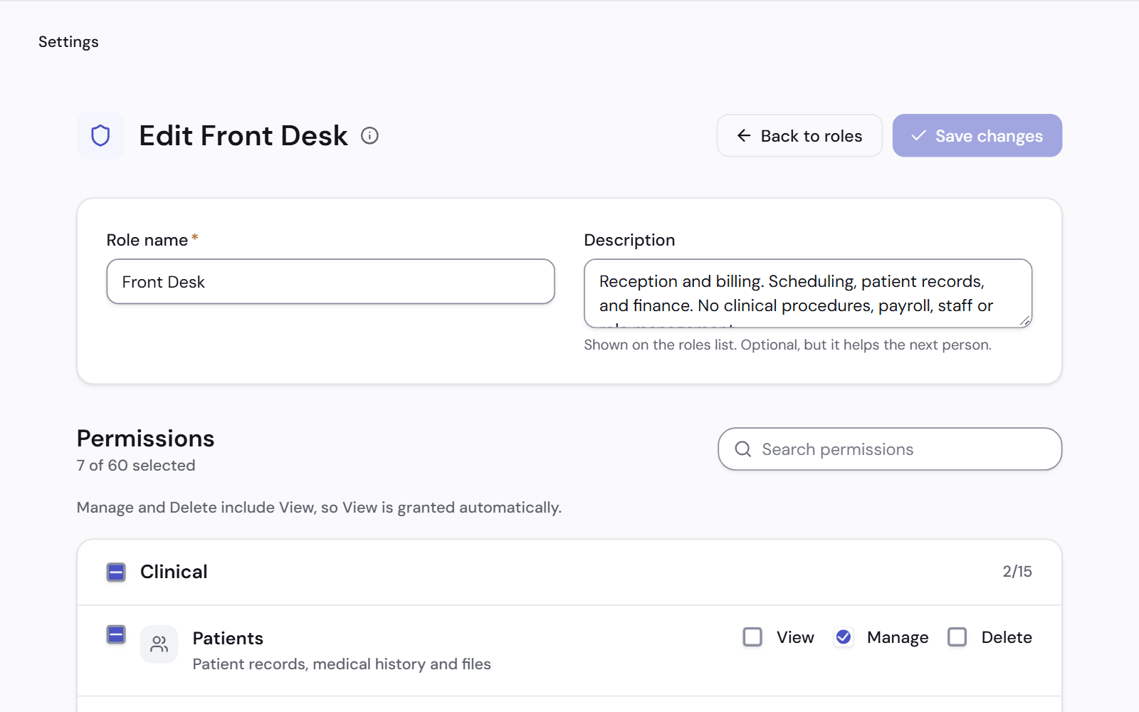 Editing a role: its name and description, and a list of permissions where each resource can be set to view, manage or delete.